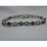 Vintage silver bracelet set with garnet, peridot, topaz and amethyst 17g