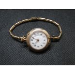 Lady's 9ct pocket watch with extending gold plated wristwatch clasp to turn from pocket watch into