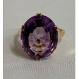 18ct gold with 12 carat Siberian amethyst oval solitaire ring 6.4g