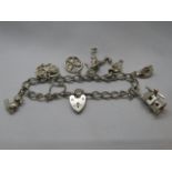 Vintage silver charm bracelet with 7x charms Birmingham 1966 22g