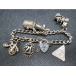 Vintage silver charm bracelet with 67x charms London 1978 3.75g