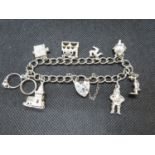 Vintage silver charm bracelet with 8x charms Birmingham 1979 27.5g