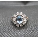 14ct white gold aquamarine and diamond cluster ring set 10 brilliant cut diamond total weight .5