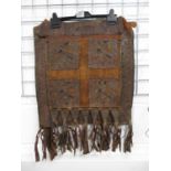 Tribal leather apron with metamorphic figures on woollen background - very old