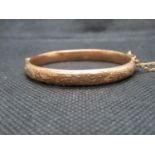 HM 9ct gold child's bangle 5.3g couple of small dents with leather case