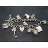 Vintage silver charm bracelet Birmingham 1971 48g 11 charms