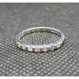 18ct white gold 7 stone princess cut eternity ring stamped .25ct