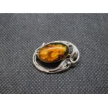 Vintage silver brooch set with Baltic amber