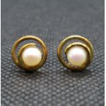 Pair of yellow metal and pearl earrings
