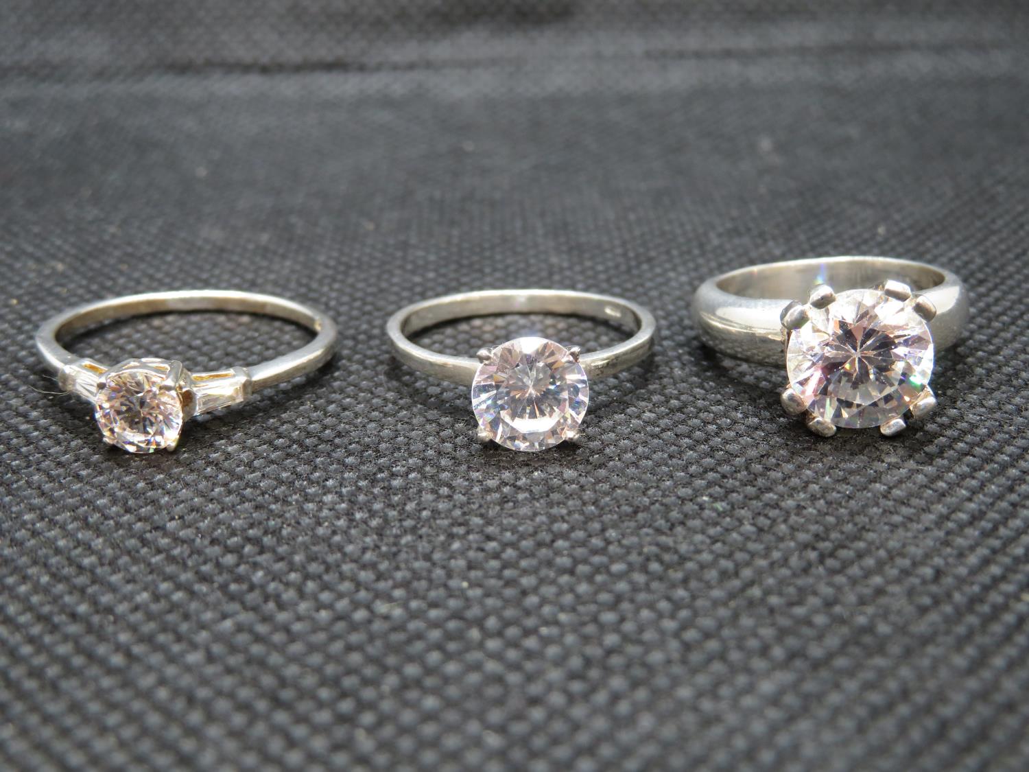 3x silver solitaire rings various sized 12.8g