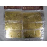 6x gold banknotes