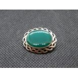 Celtic design silver brooch set with green agate stone