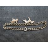 Silver charm bracelet with two silver dog charms