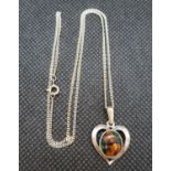 Silver chain with heart stone