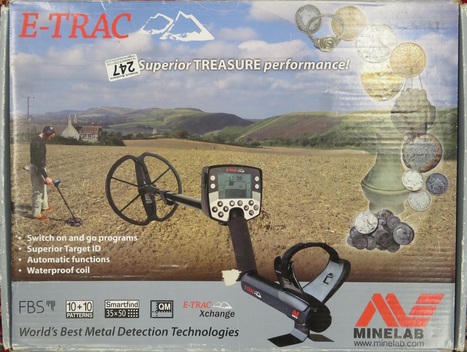 Minelab E-trac metal detector in full working order with headphones, dustcover and battery charger