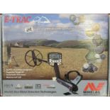 Minelab E-trac metal detector in full working order with headphones, dustcover and battery charger