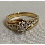 9ct gold diamond set crossover ring fully HM 3.3g