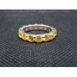 Silver full hoop eternity ring set with citrine stones size Q 5g