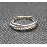 18ct white gold and diamond crossover ring