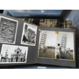 Collection of photo albums books and postcards