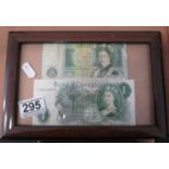 2x framed old £1.00 banknotes both Joe Page