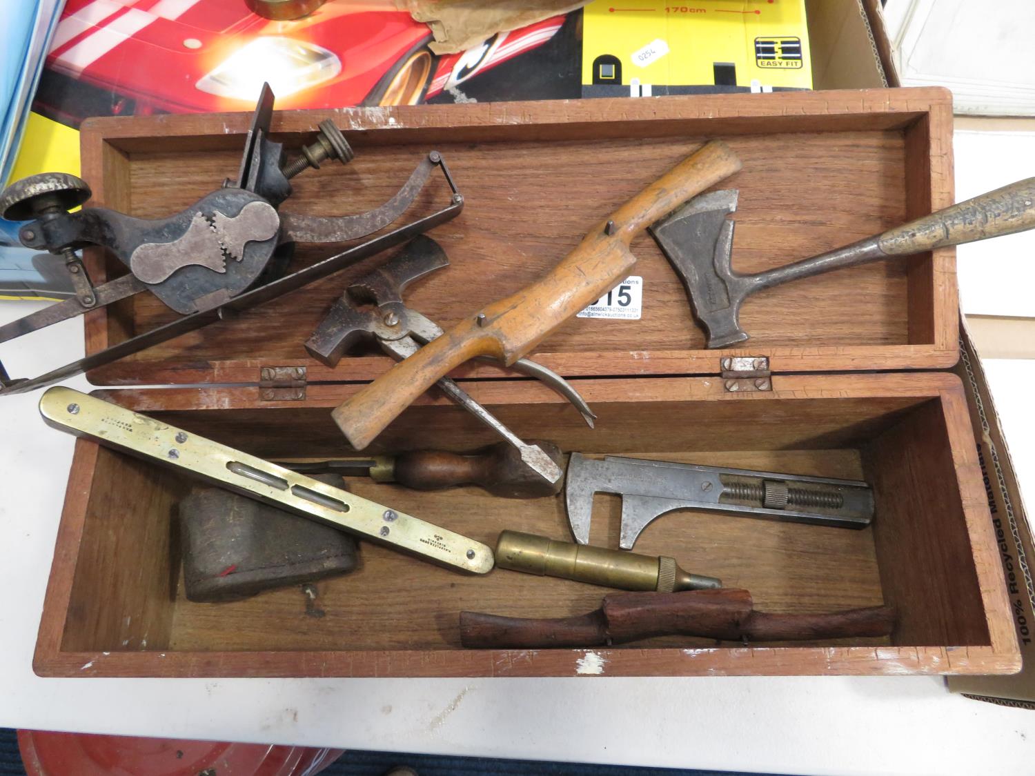 Stanley 113 plane, some brass and ebony spirit levels and other tools in solid wooden box