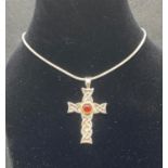 Silver Celtic design cross with cabochon garnet engraved in Gaelic on reverse Mo Gra Thu ( You are