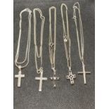 Five silver crosses on 18" silver chain