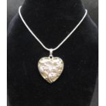 Pretty pierced silver reversible Mother of Pearl heart shaped pendant on 18" silver serpentine