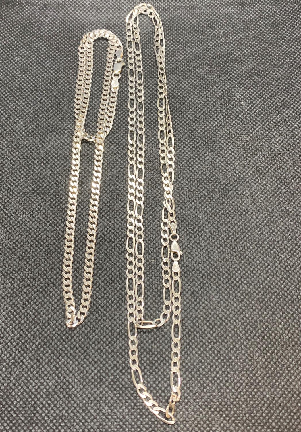 2x silver chain HM 1 is 18" curb link and 1 is figaro chain 22g total weight