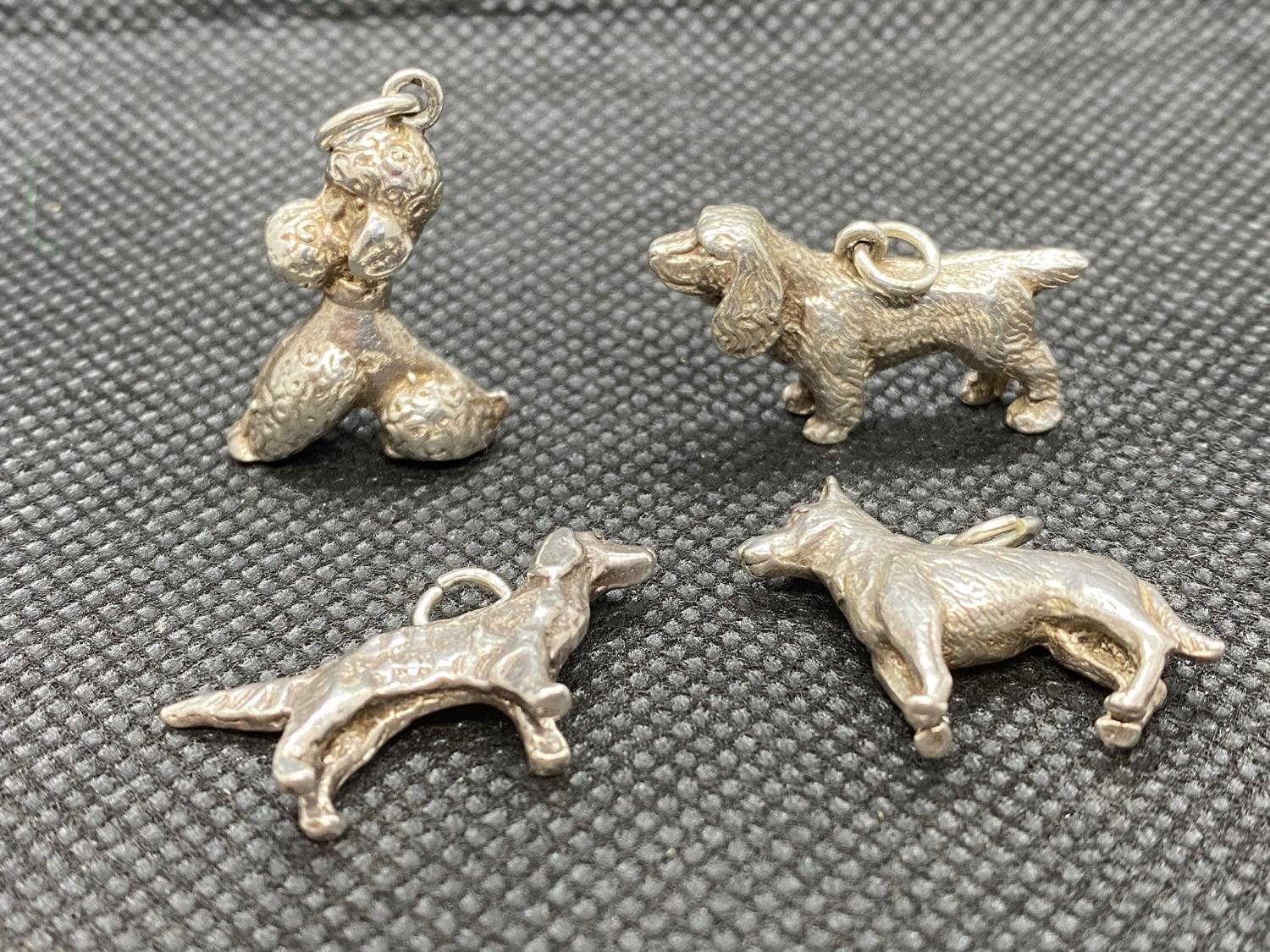 4x silver dog charms 26g