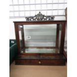 Victorian glass shop display with under drawer