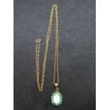 Opal and emerald pendant on 9ct necklace