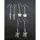 Selection of silver earrings and chain