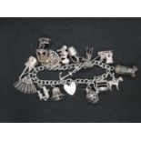 Vintage silver charm bracelet with 15 charms London 1979 62g