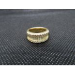 18ct ring size L with baguette diamonds and small chippings on edges 12.7g 18ct gold
