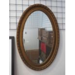 Oval bevelled edge framed mirror 28 x 20"