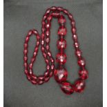 44" rope of amber/bakolite beads