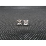 2x square cut circonia and silver earrings