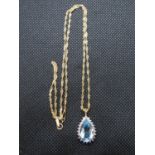 9ct necklace with blue stone pendant
