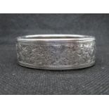 Victorian child's bangle no HM engraved with Ivy leaves 2" x 1.75" 28g