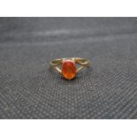 9ct ring with orange stone size P 1.7g