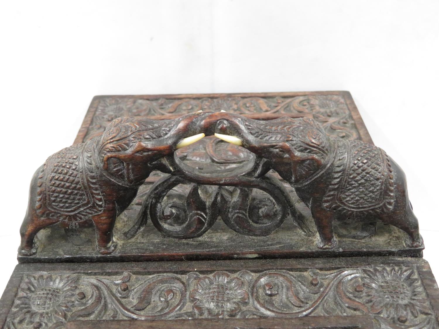 Highly carved Indian ebony box with elephants and carved ivory lion paw feet 12" x 6" x 7" - Image 7 of 8