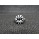 White gold and aquamarine and diamond cluster ring .5ct