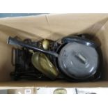 Box of old black enamelled pans, irons and other Victorian kitchenalia