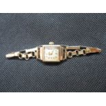 1 Ladies 9ct strap and case record watch