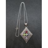 Large diamond shaped pendant with stones on chain