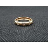 18ct gold ring with approx .5ct diamonds 5.5g size O