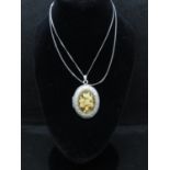 HM gold on silver locket 18" silver curb chain