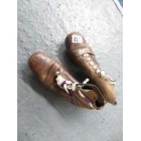 Pair of leather studded 1920's Manfield football boots